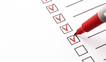 red marker checking off checklist