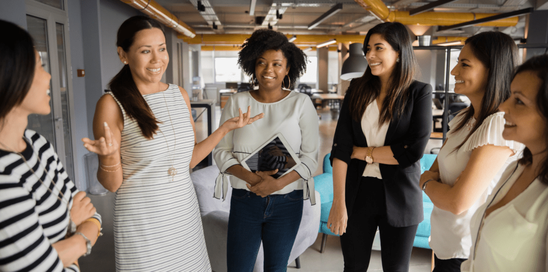 diverse businesswomen talking